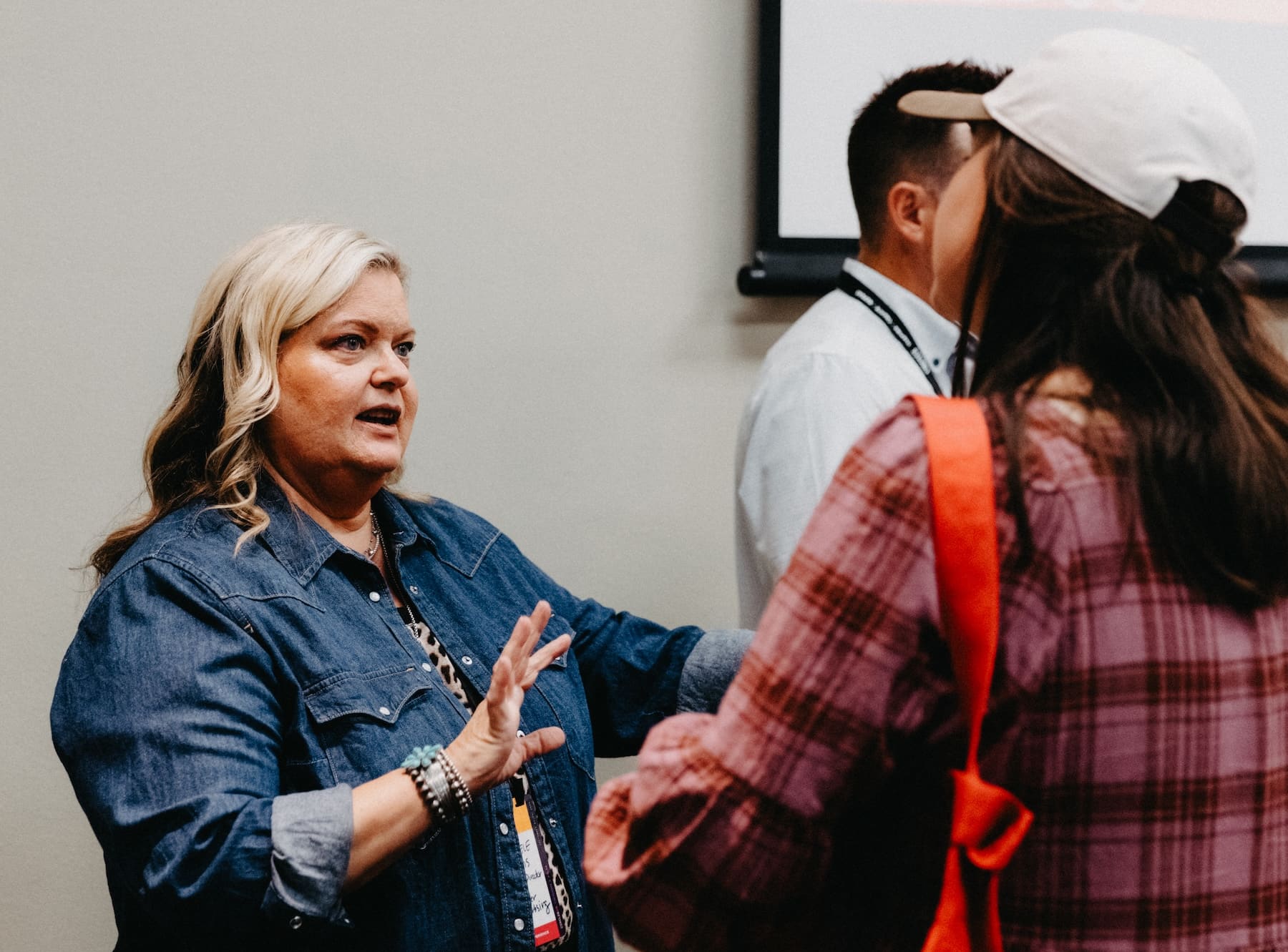 Michele Talking with Guests